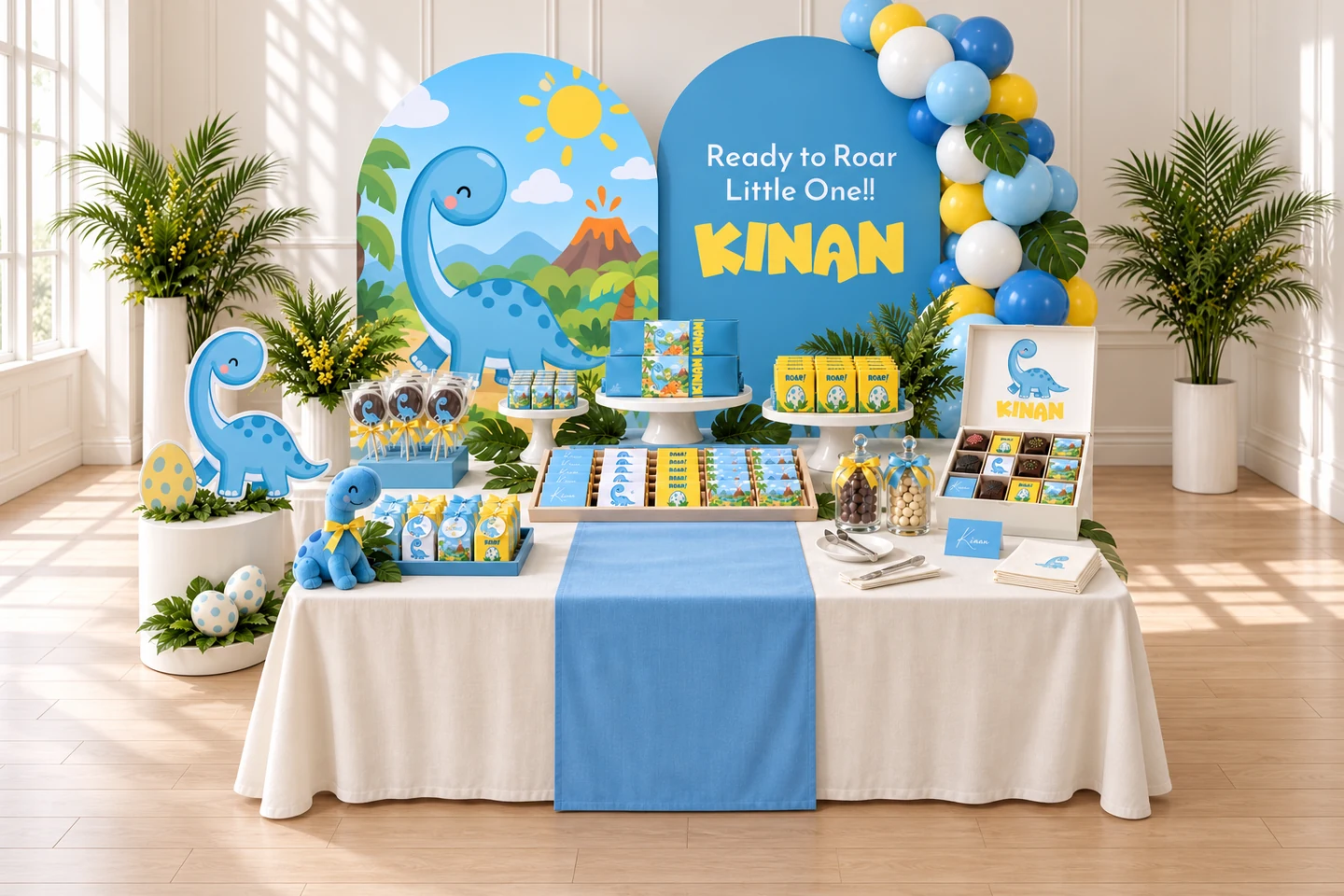Inspiration Kinan : chocolats et emballages assortis, dinosaure bleu, jaune et ciel